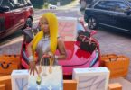 Nicki Minaj gives away her diamond barbie neckless.